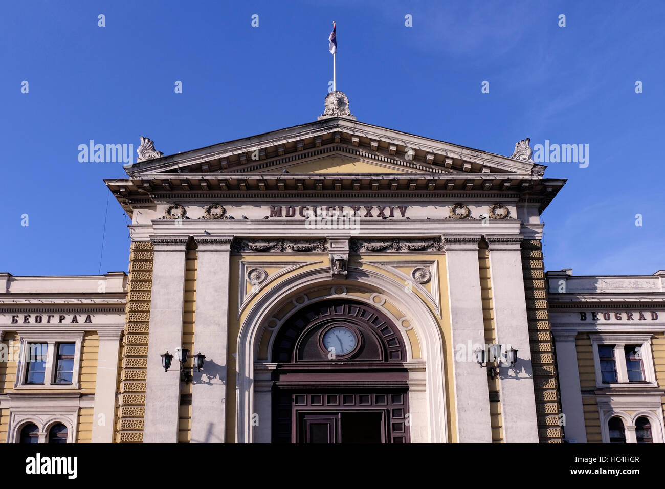 The front facade of the main railway station designed in the style of academism with triangular tympanum in the city of Belgrade capital of the Republic of Serbia Stock Photo