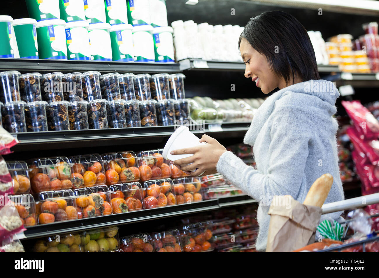 Woman shopping for groceries Stock Photo