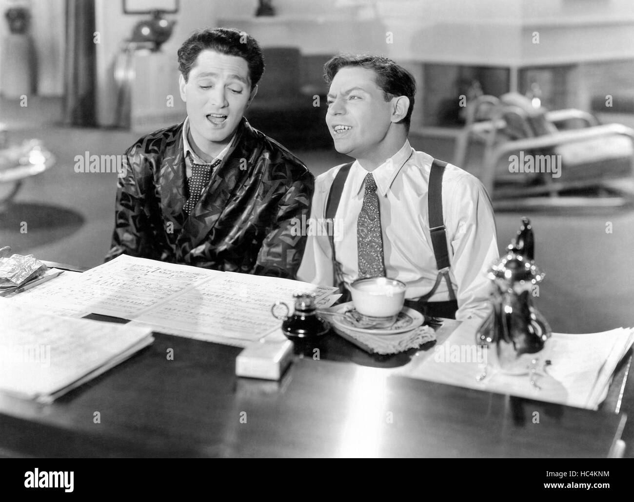 RHAPSODY IN BLUE, from left: Robert Alda as George Gershwin, Oscar Levant, 1945 Stock Photo