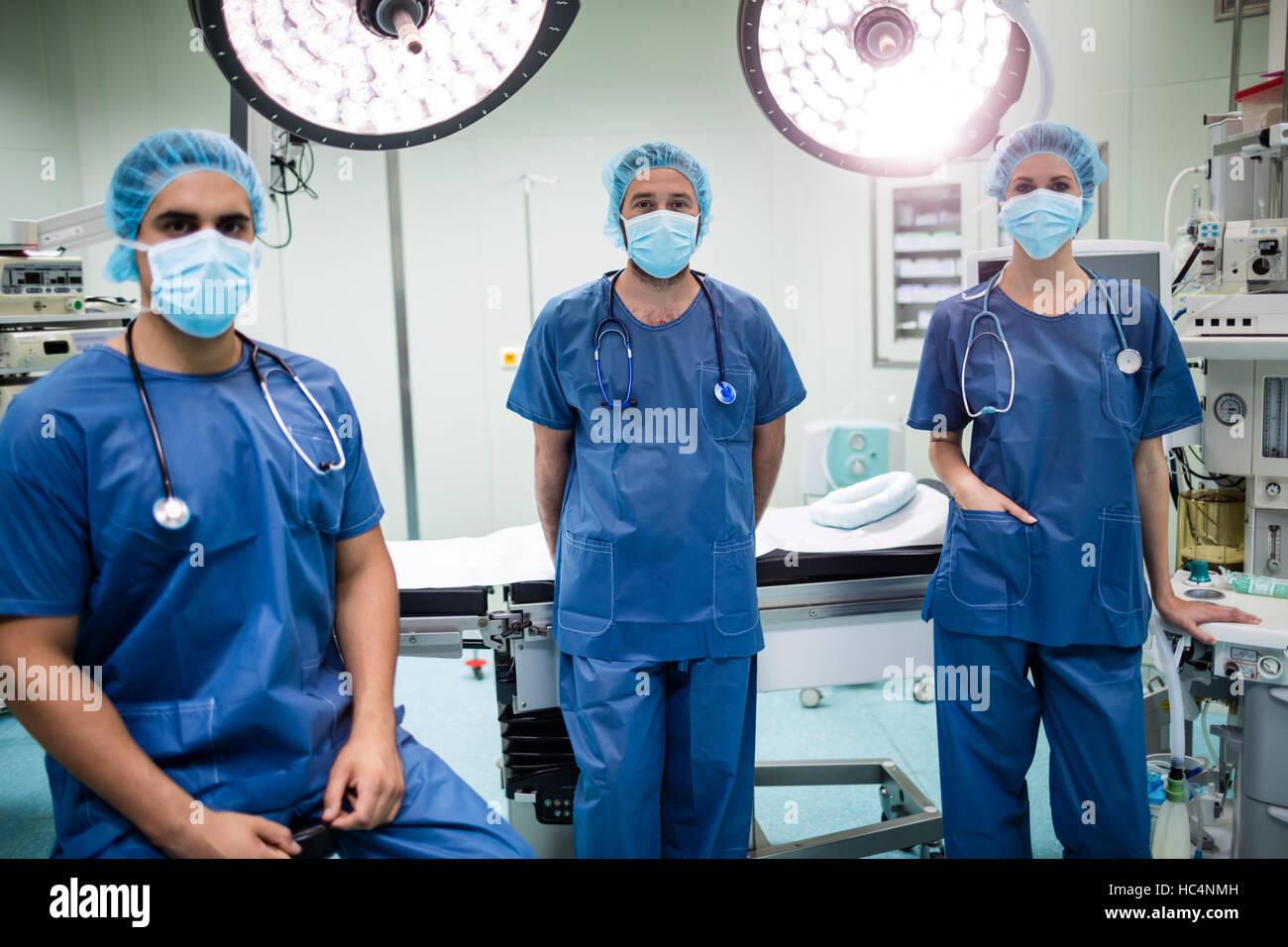 Portrait of surgeons in operation room Stock Photo - Alamy