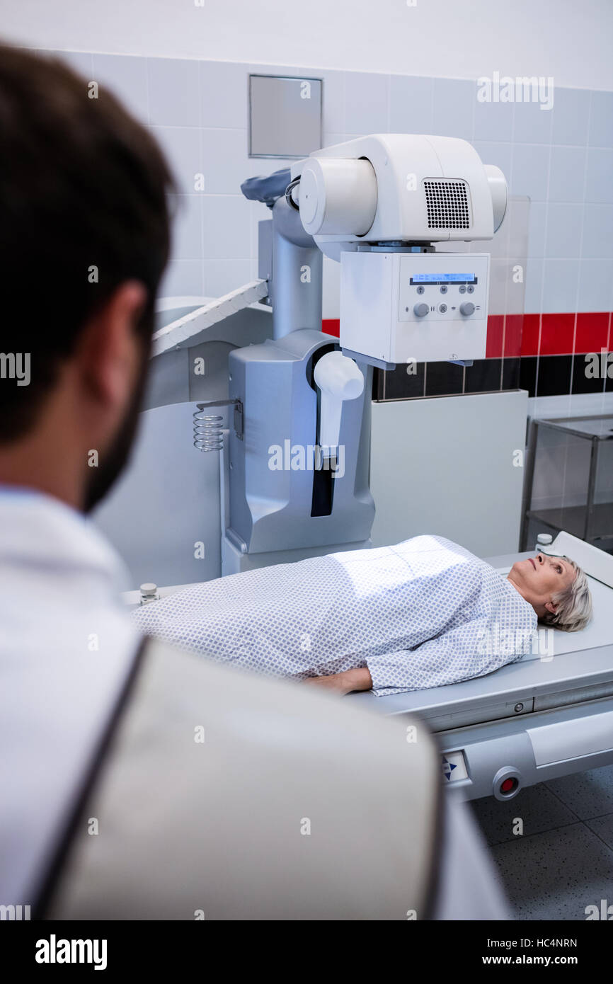Female patient going through xray test Stock Photo Alamy