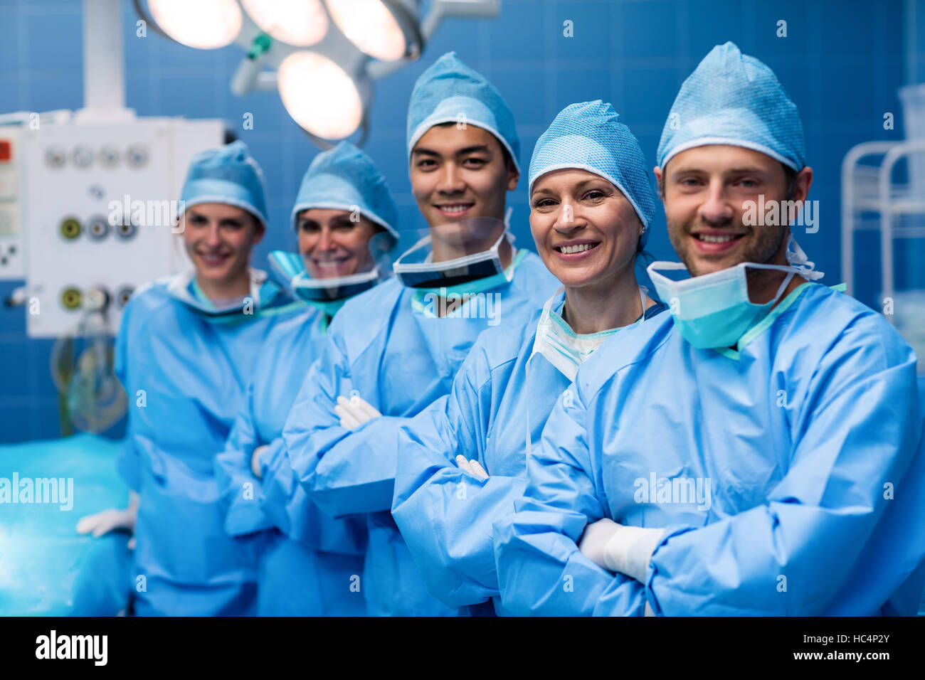 Portrait of surgeons standing in operation room Stock Photo - Alamy