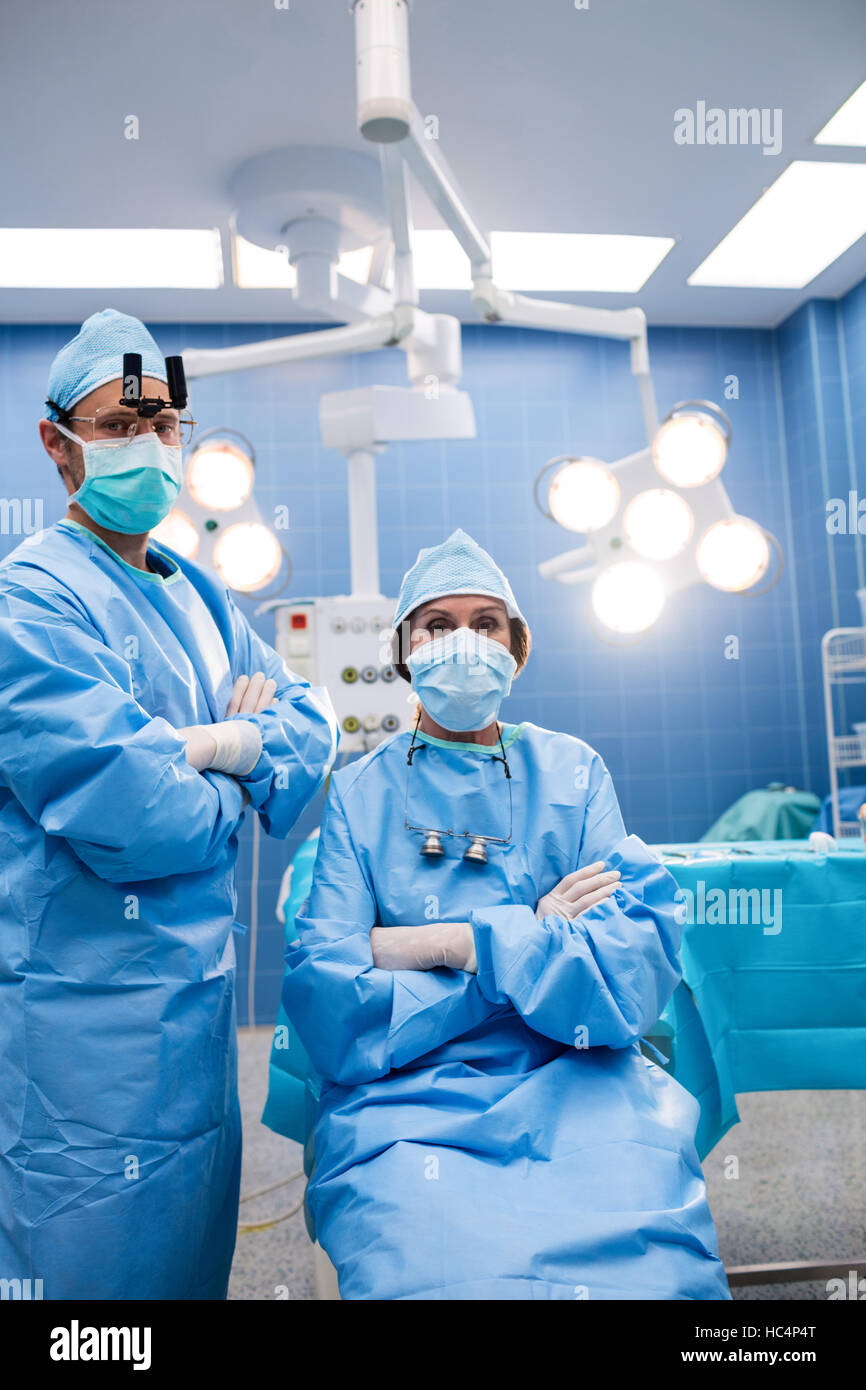 Portrait of surgeons in operation room Stock Photo - Alamy