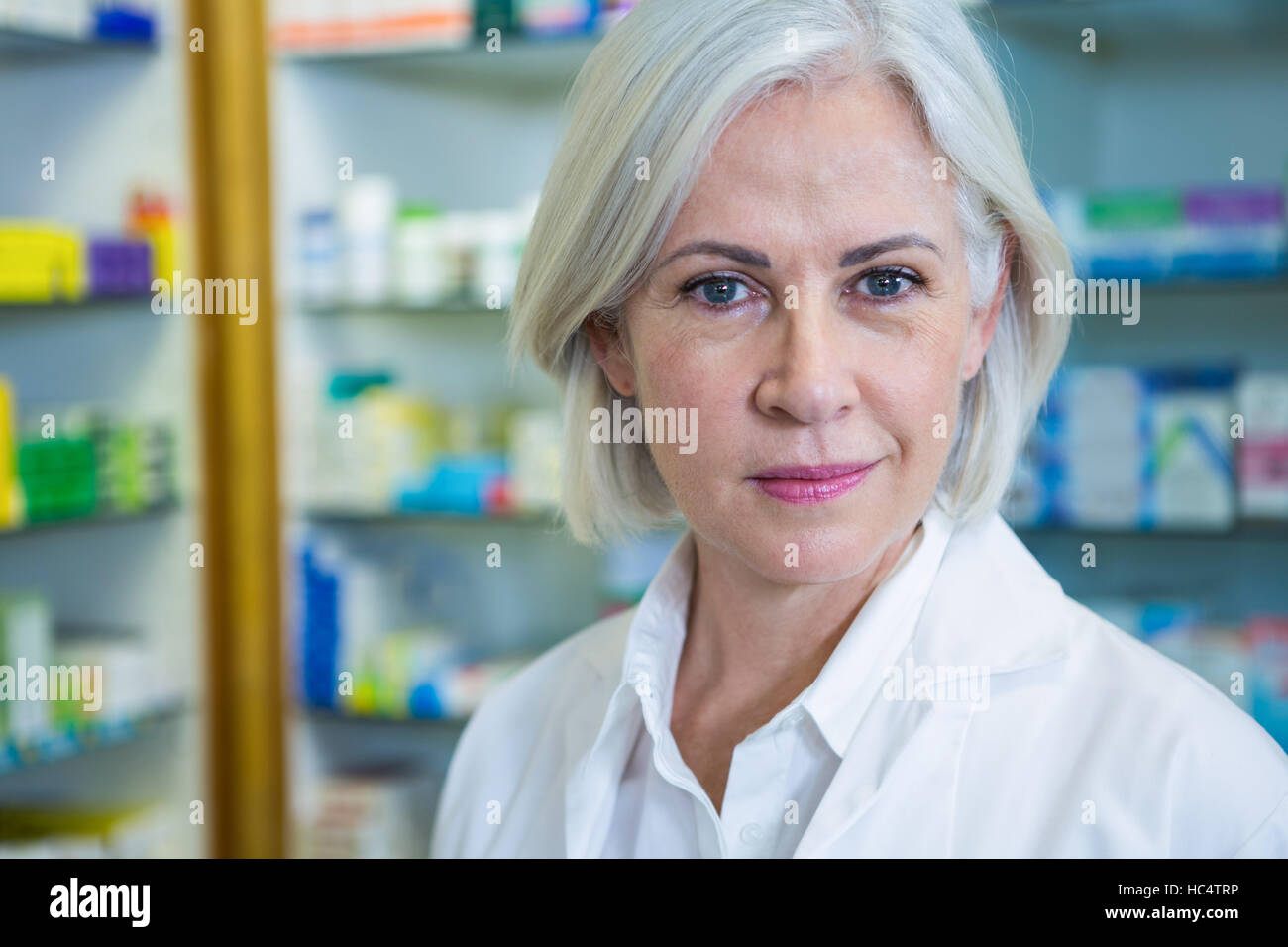 Pharmacist in lab coat Stock Photo Alamy
