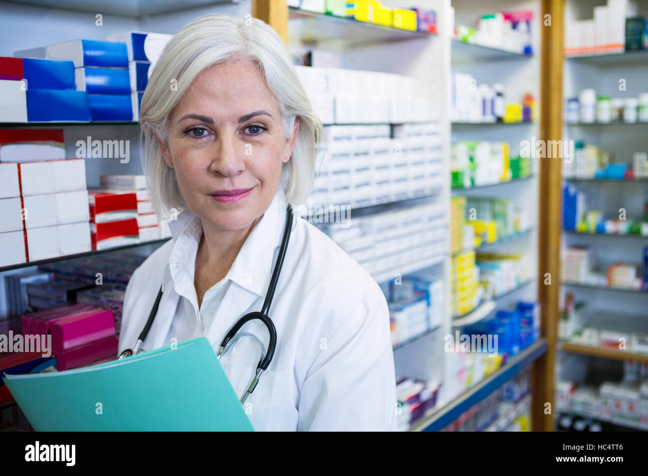 Pharmacist holding a file Stock Photo Alamy