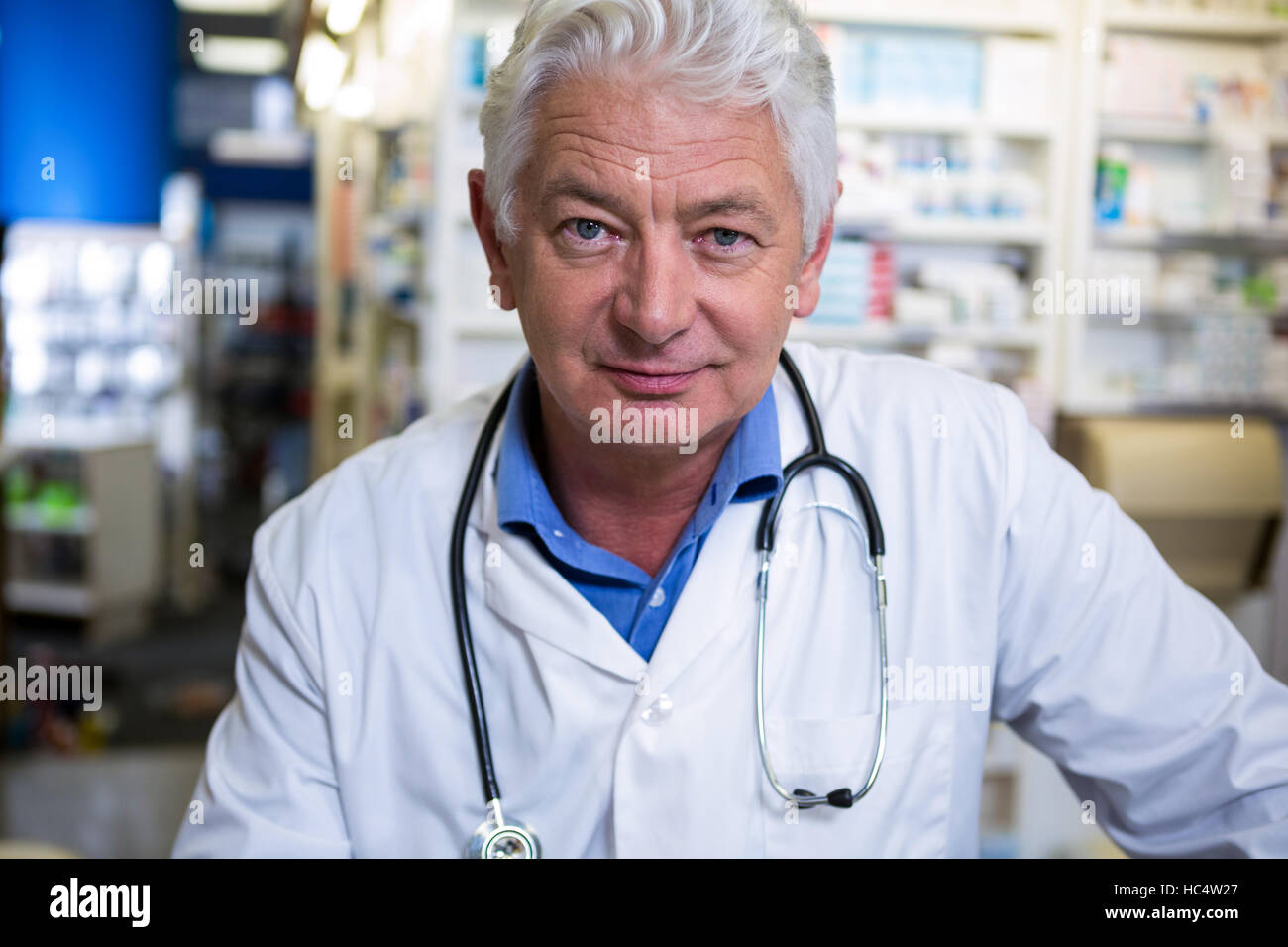 Pharmacist in lab coat Stock Photo Alamy
