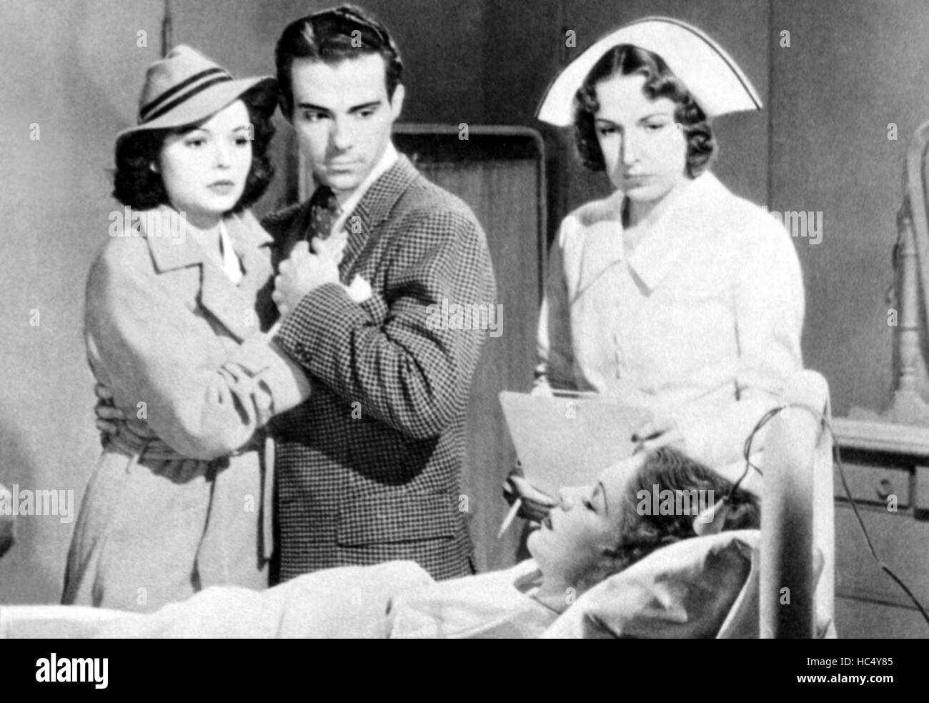 REBELLIOUS DAUGHTERS, left Marjorie Reynolds, laying down Sheila