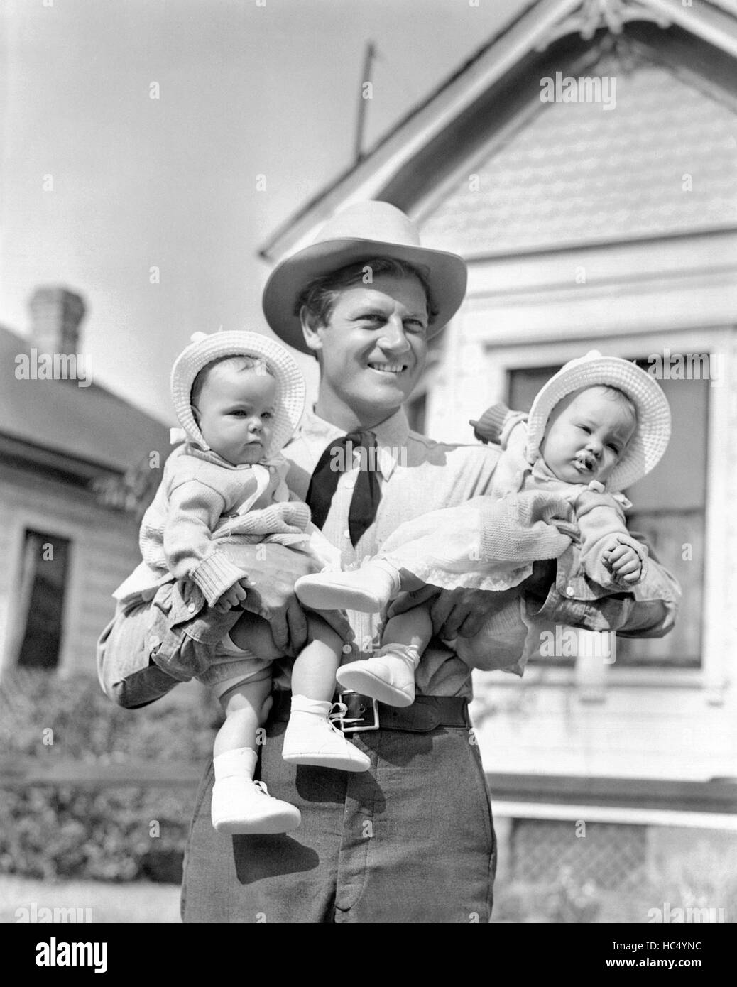 REACHING FOR THE SUN, Joel McCrea, holding baby actresses June Hedin ...