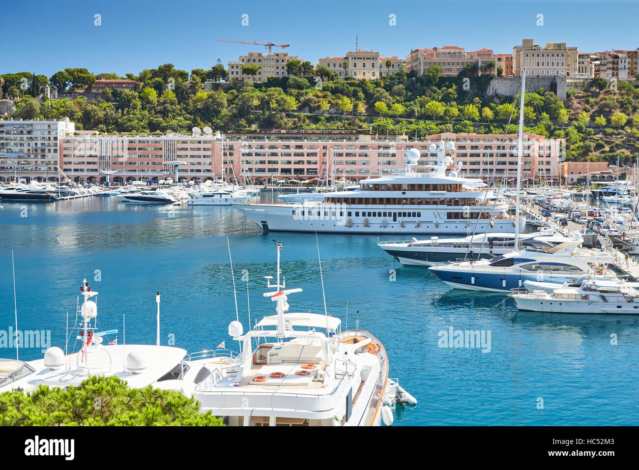Monaco, Monte-Carlo, Monaco Ville, 8 August 2016: Port Hercules, the preparation of the yacht show MYS, sunny day, many yachts Stock Photo