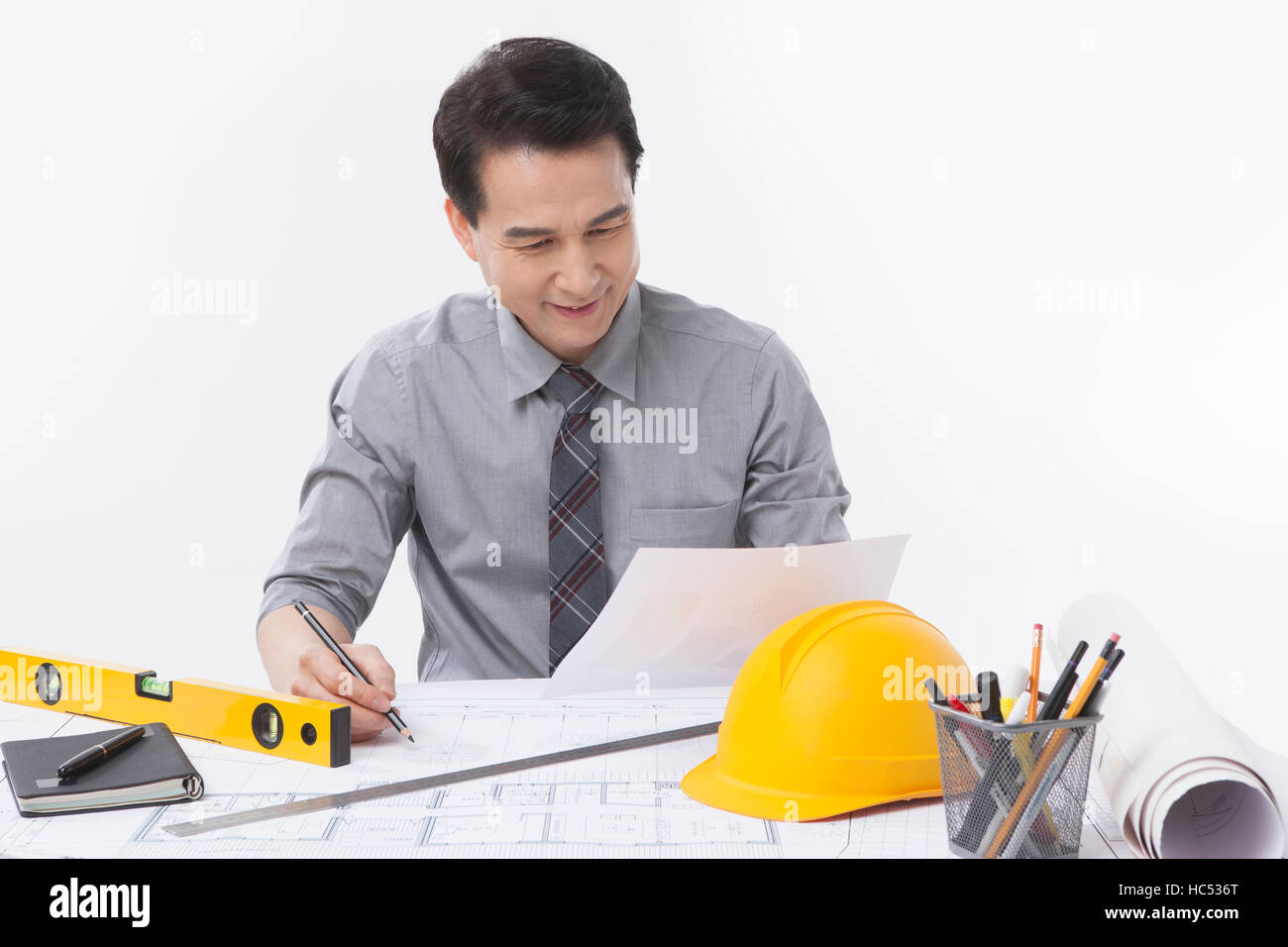 Portrait of smiling middle aged architect Stock Photo