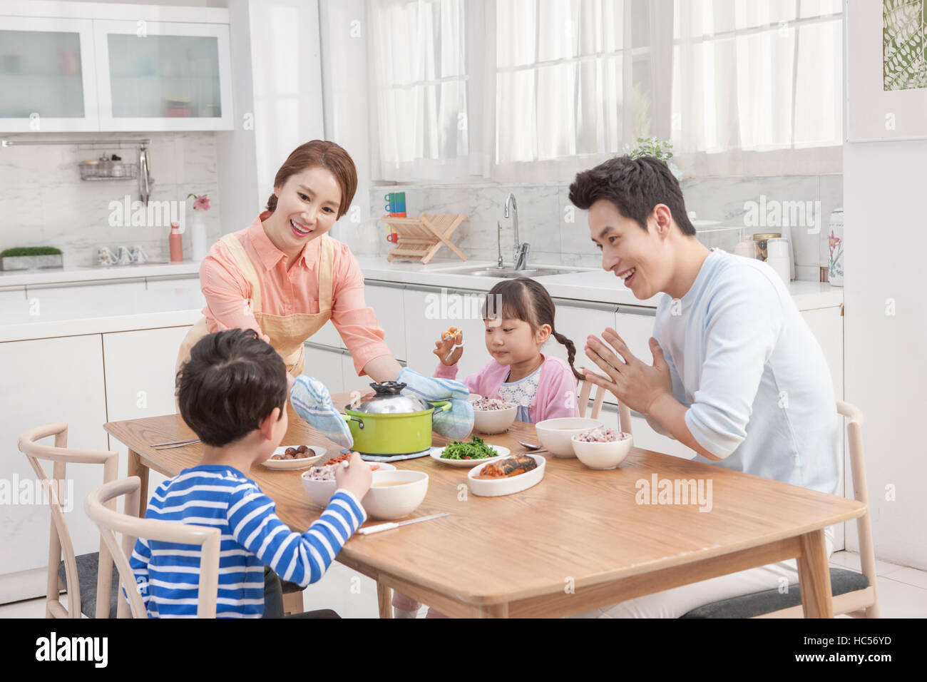 Harmonious family having meals Stock Photo Alamy(08)