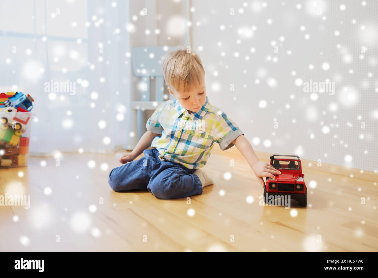 little baby boy playing with toy car at home Stock Photo - Alamy