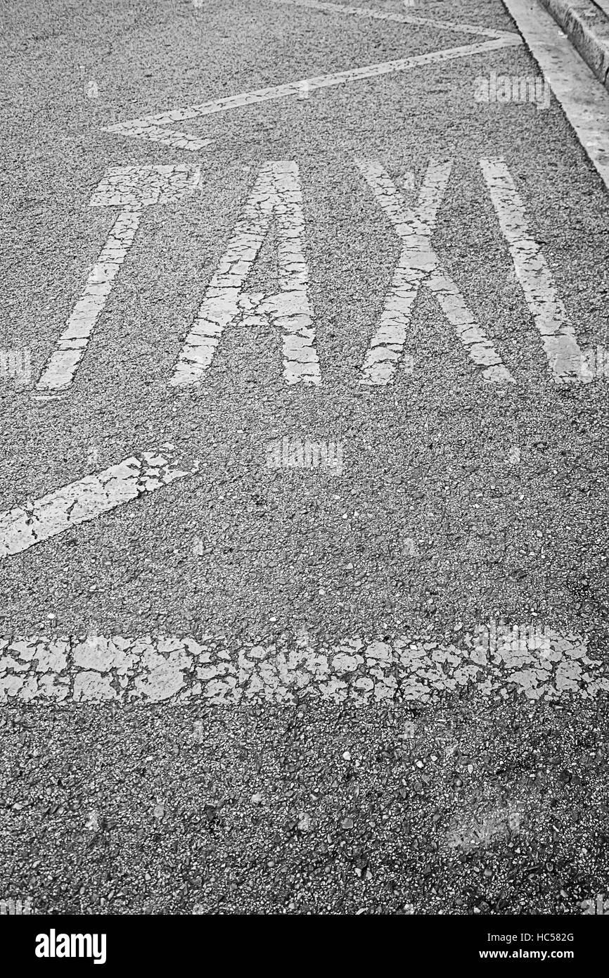 Taxi sign on urban road, vehicle and transportation Stock Photo