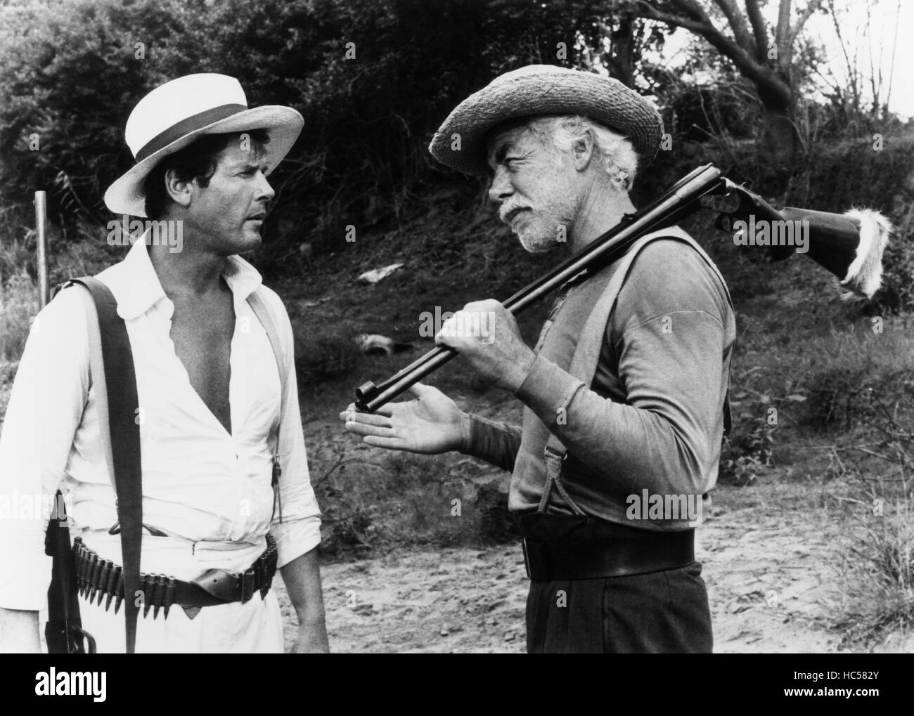 SHOUT AT THE DEVIL, from left, Roger Moore, Lee Marvin, 1976 Stock Photo Alamy