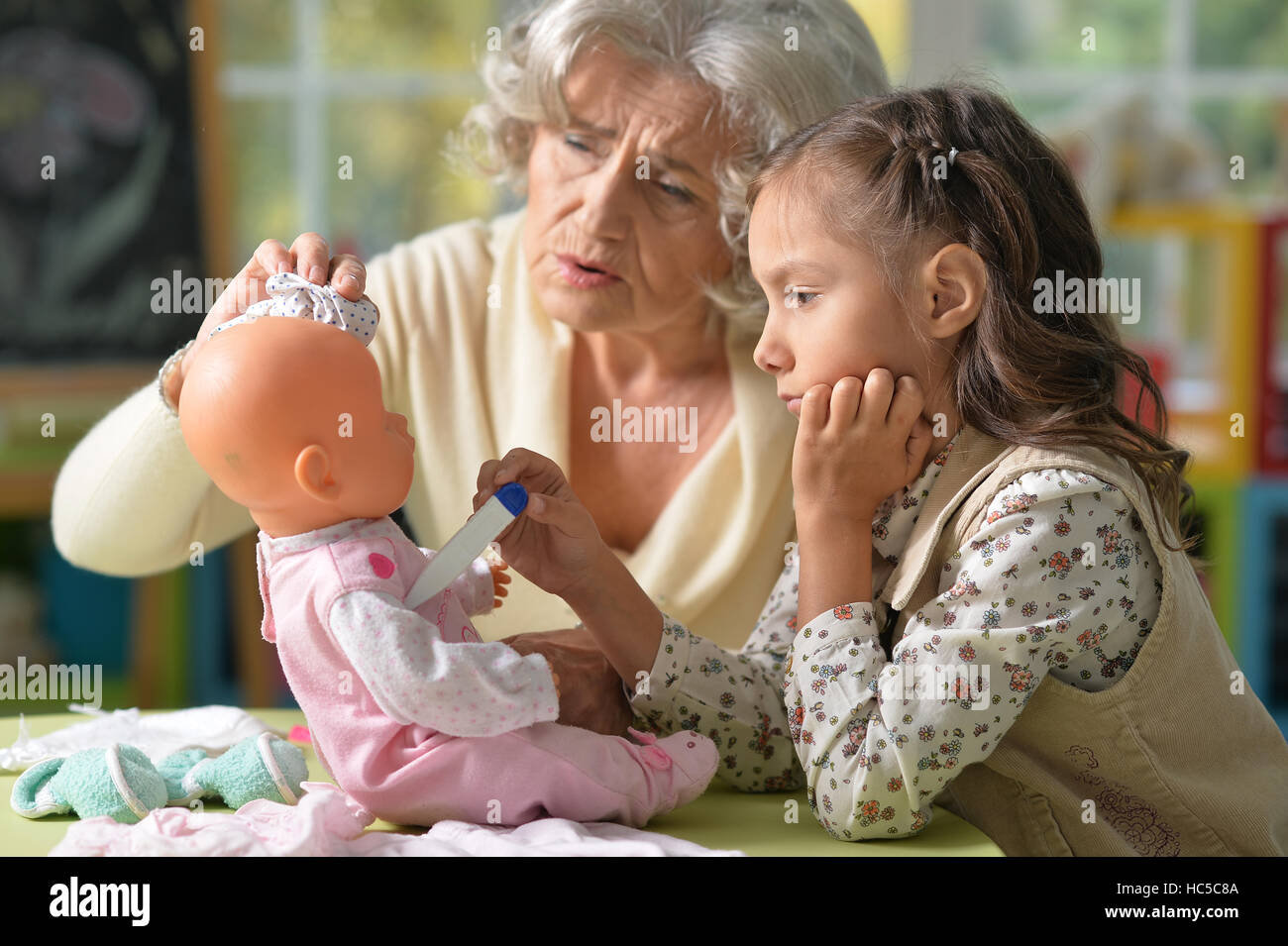 Grandmother and child play Stock Photo