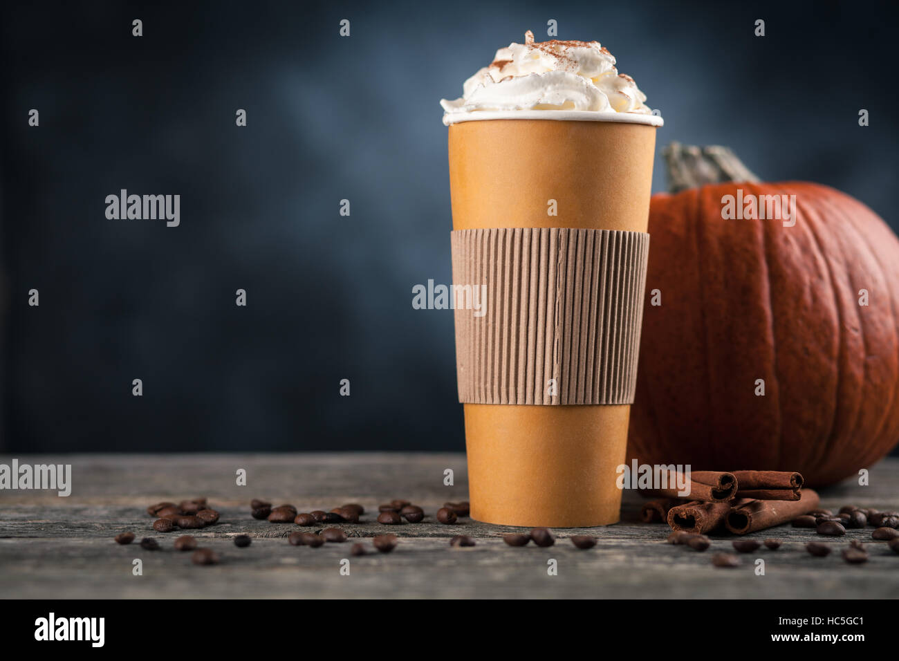 Pumpkin spice latte in a paper cup Stock Photo - Alamy