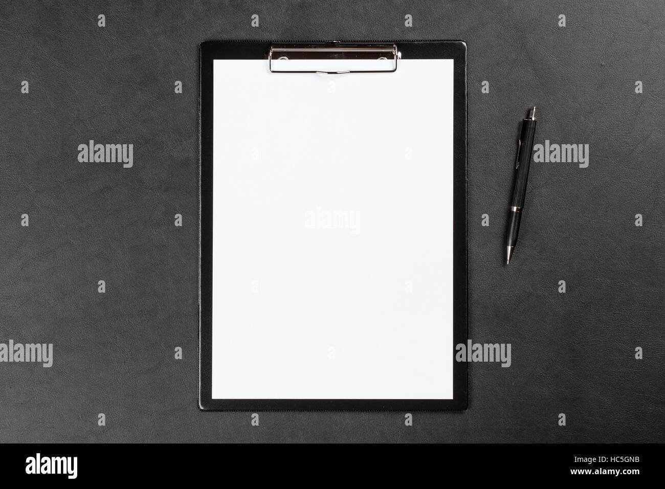 Black clipboard on a table Stock Photo Alamy