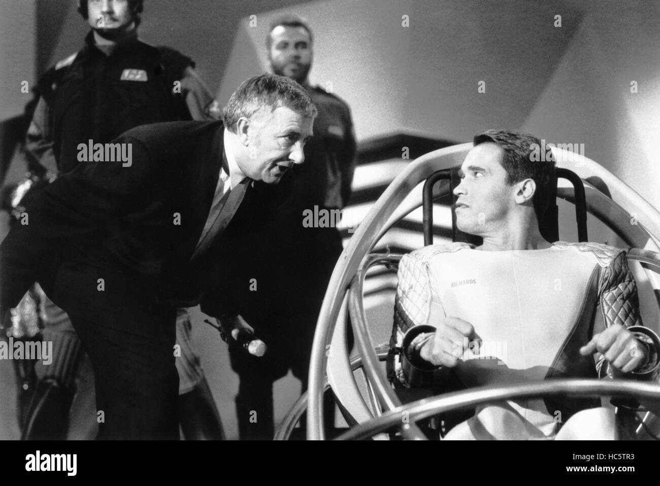 THE RUNNING MAN, from left, Richard Dawson, Arnold Schwarzenegger, 1987, ©TriStar Pictures