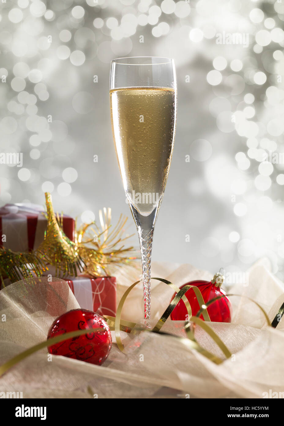 Luxury champagne glass, gift and decoration on an abstract grey