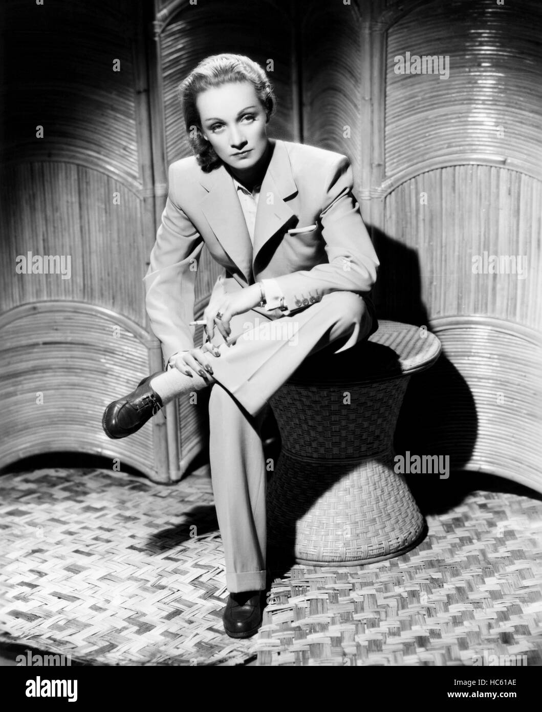 SEVEN SINNERS, Marlene Dietrich, in a beige wool suit, 1940 Stock Photo -  Alamy