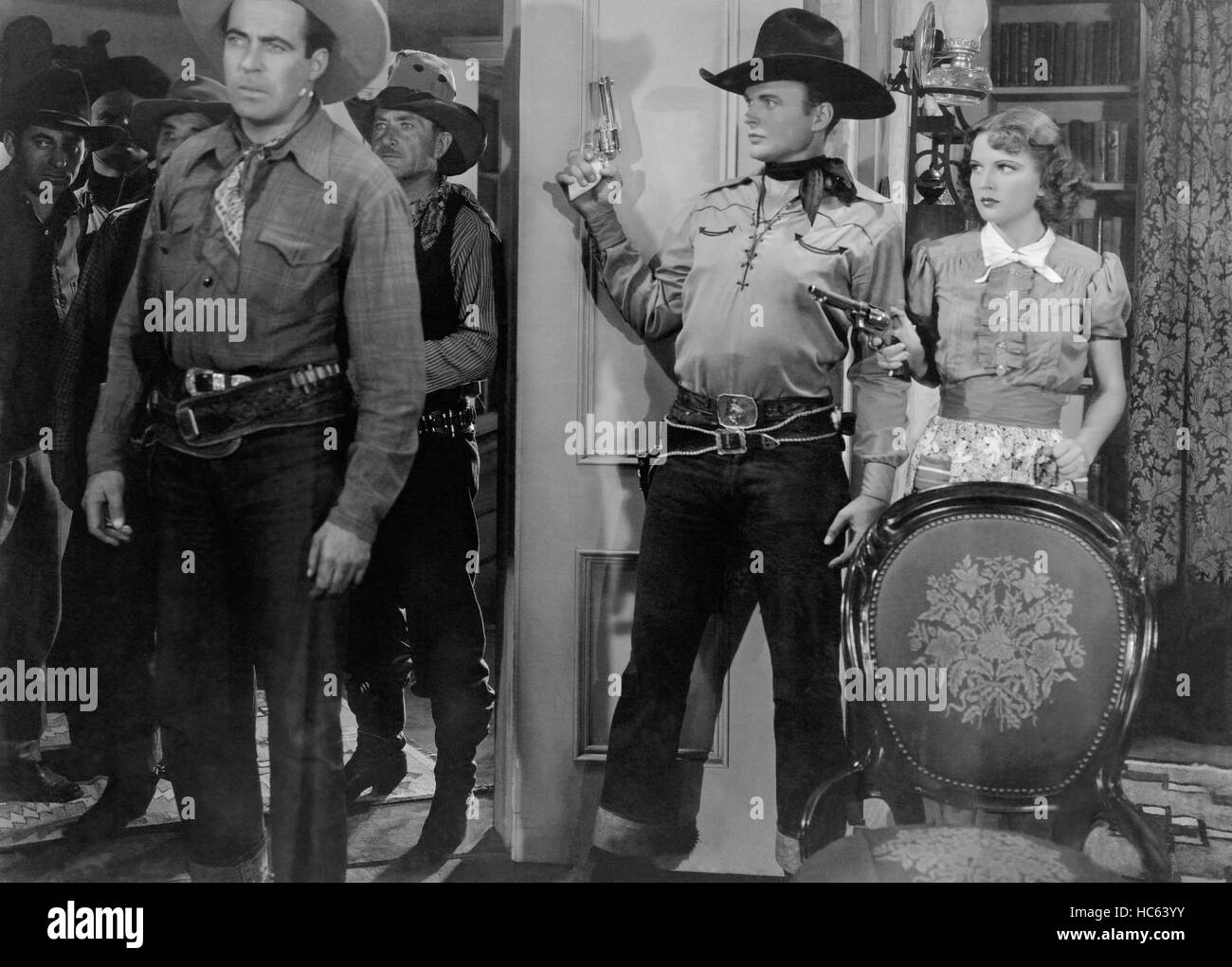 THE SINGING OUTLAW, front from left LeRoy Mason, Bob Baker, Joan