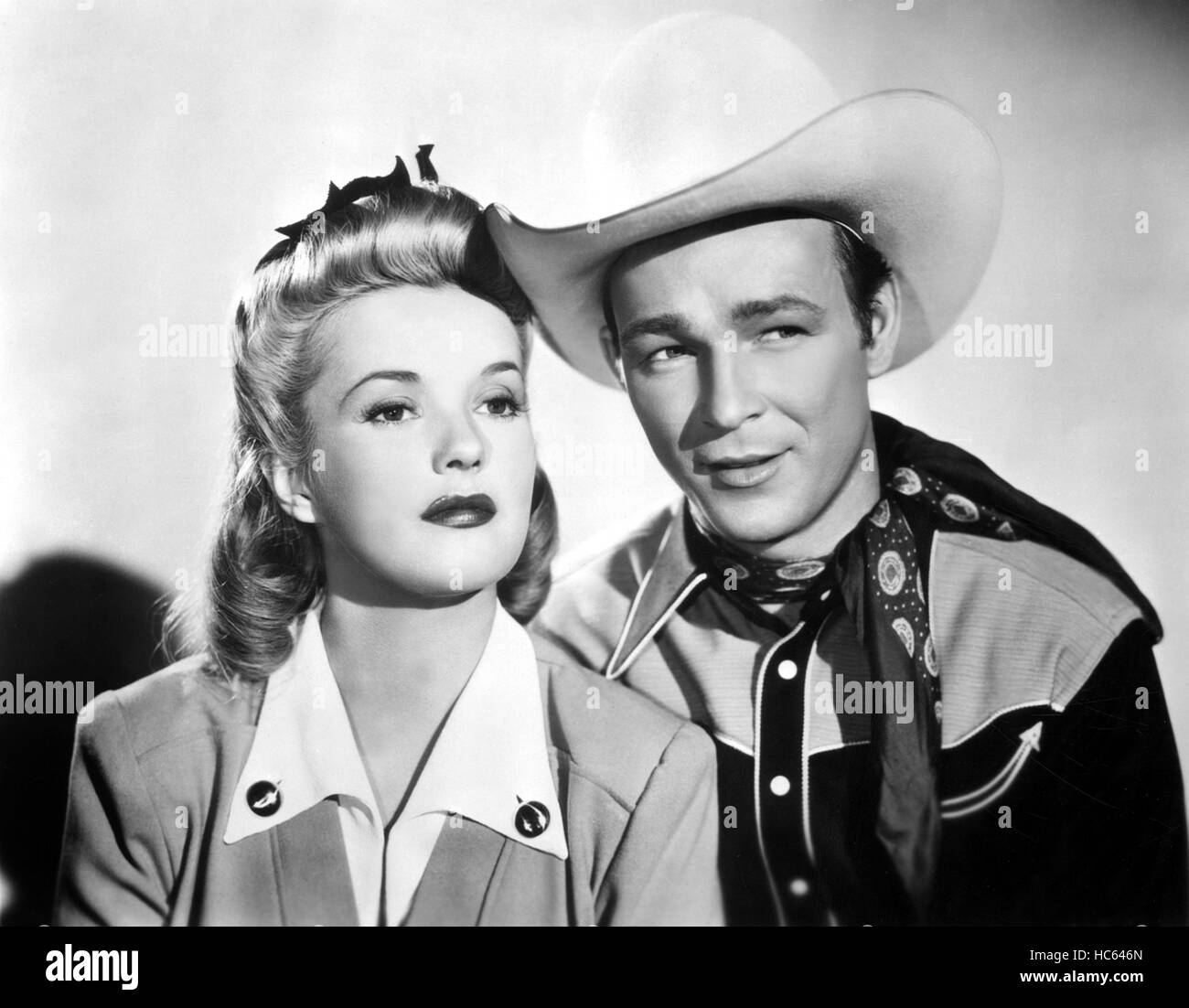 SILVER SPURS, from left: Phyllis Brooks, Roy Rogers, 1943 Stock Photo ...