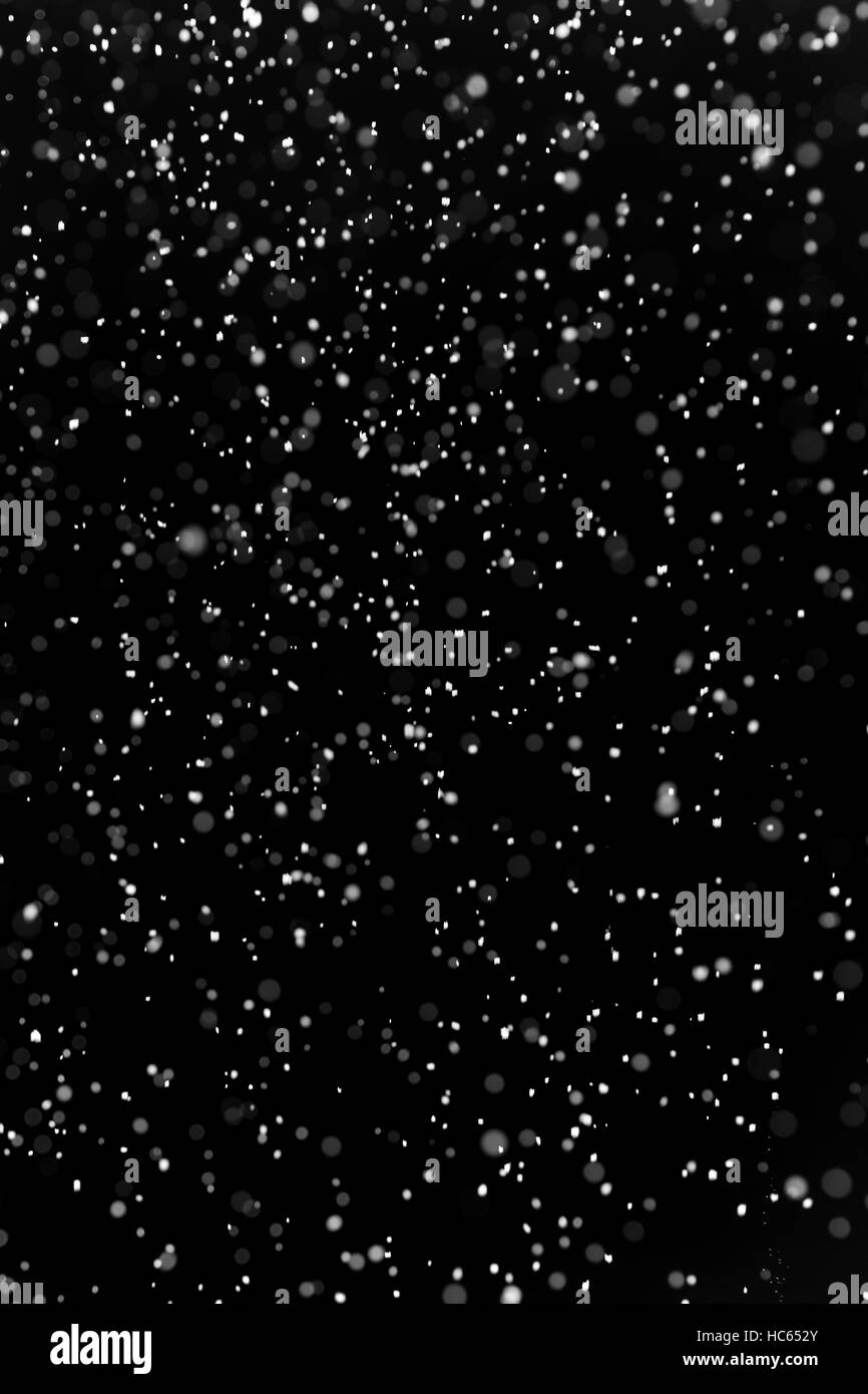 Abstract background glitter snow on black surface Stock Photo - Alamy