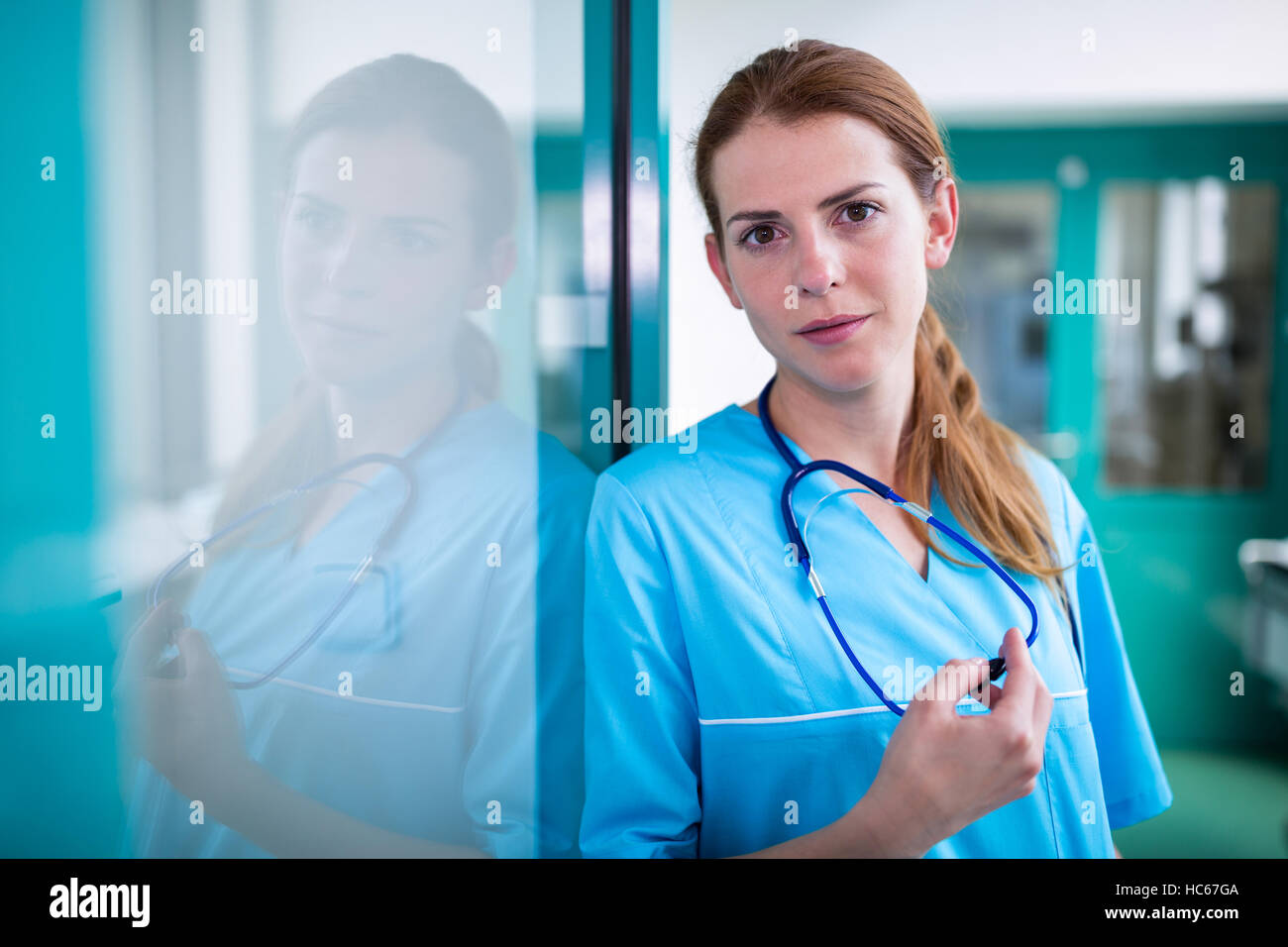 Portrait of surgeon standing in surgical room Stock Photo - Alamy