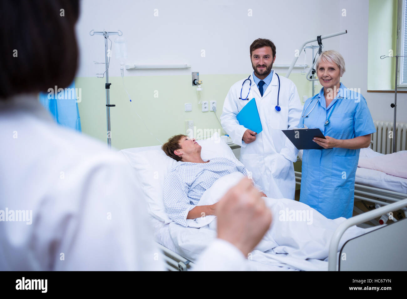 Doctor talking to a senior patient Stock Photo