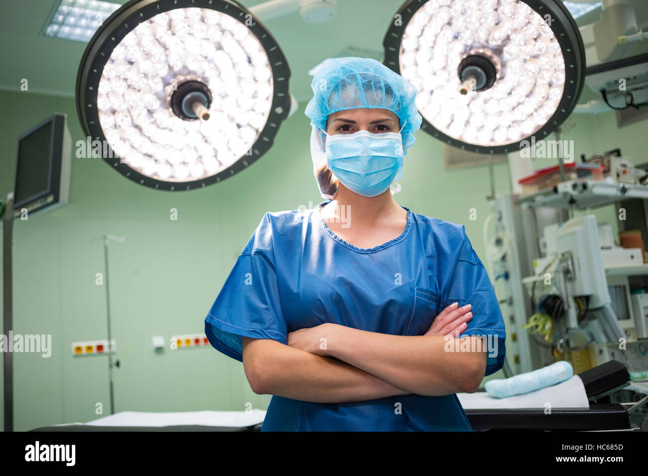 Portrait of a female surgeon standing in operation room Stock Photo - Alamy