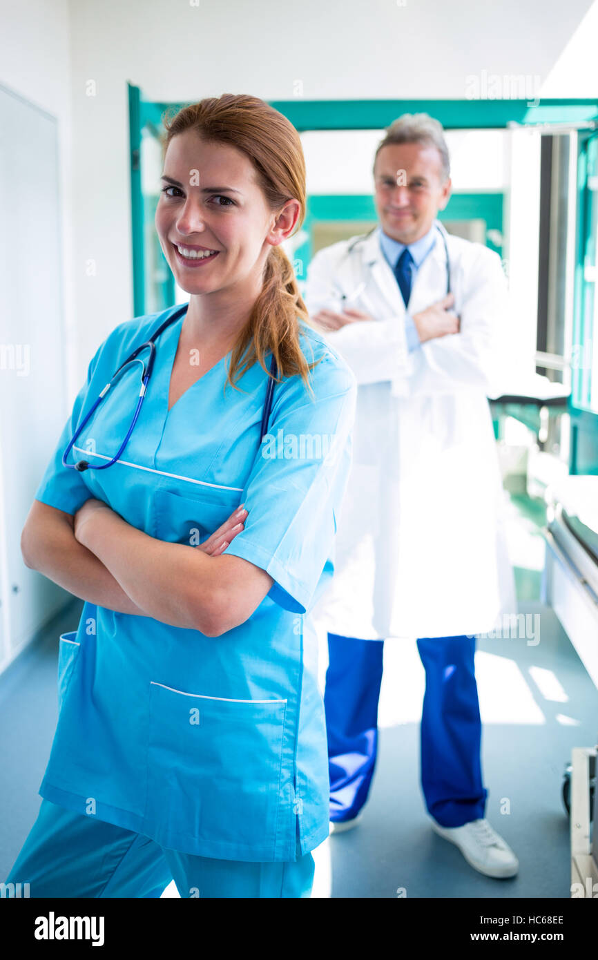 Portrait of doctor and nurse standing with arms crossed Stock Photo - Alamy