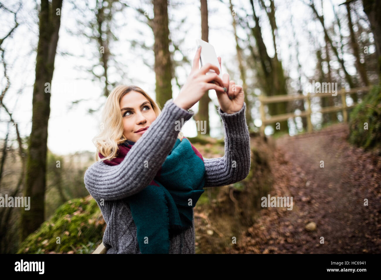 Beautiful woman taking selfie on mobile phone Stock Photo - Alamy