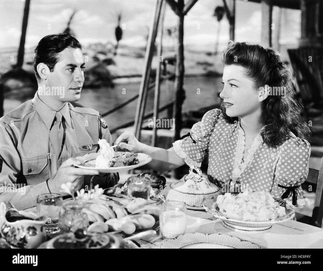 SUNDAY DINNER FOR A SOLDIER From Left John Hodiak Anne Baxter 1944 anne-baxter-john-hodiak-sunday-dinner-for-a-soldier-1944-stock-photo