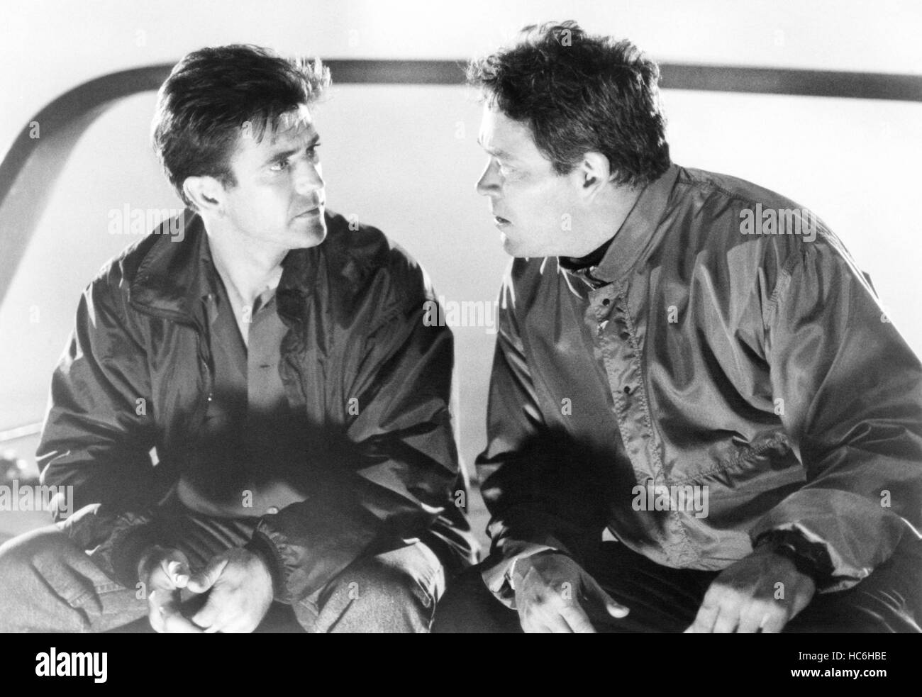 TEQUILA SUNRISE, from left Mel Gibson, Raul Julia, 1988. ©Warner