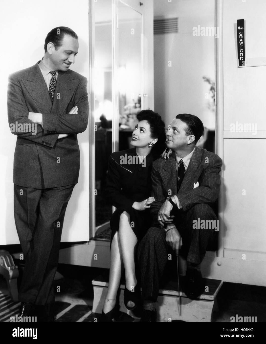 THEY ALL KISSED THE BRIDE, from left, Melvyn Douglas, Joan Crawford ...