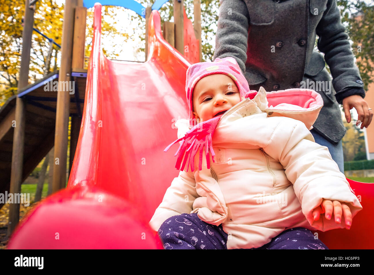 children slide park outdoor playground winter recreation Stock Photo