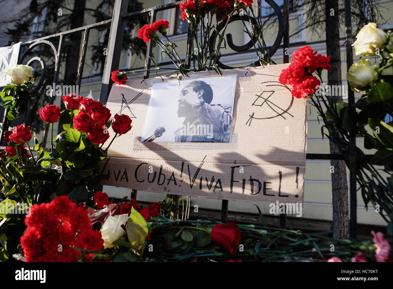 MOSCOW - 27 NOVEMBER,2016: Memorial with flovers at embassy of Rebulic Cuba.People mourn over death of Cuban President Fidel Castro.Funeral of natoina Stock Photo