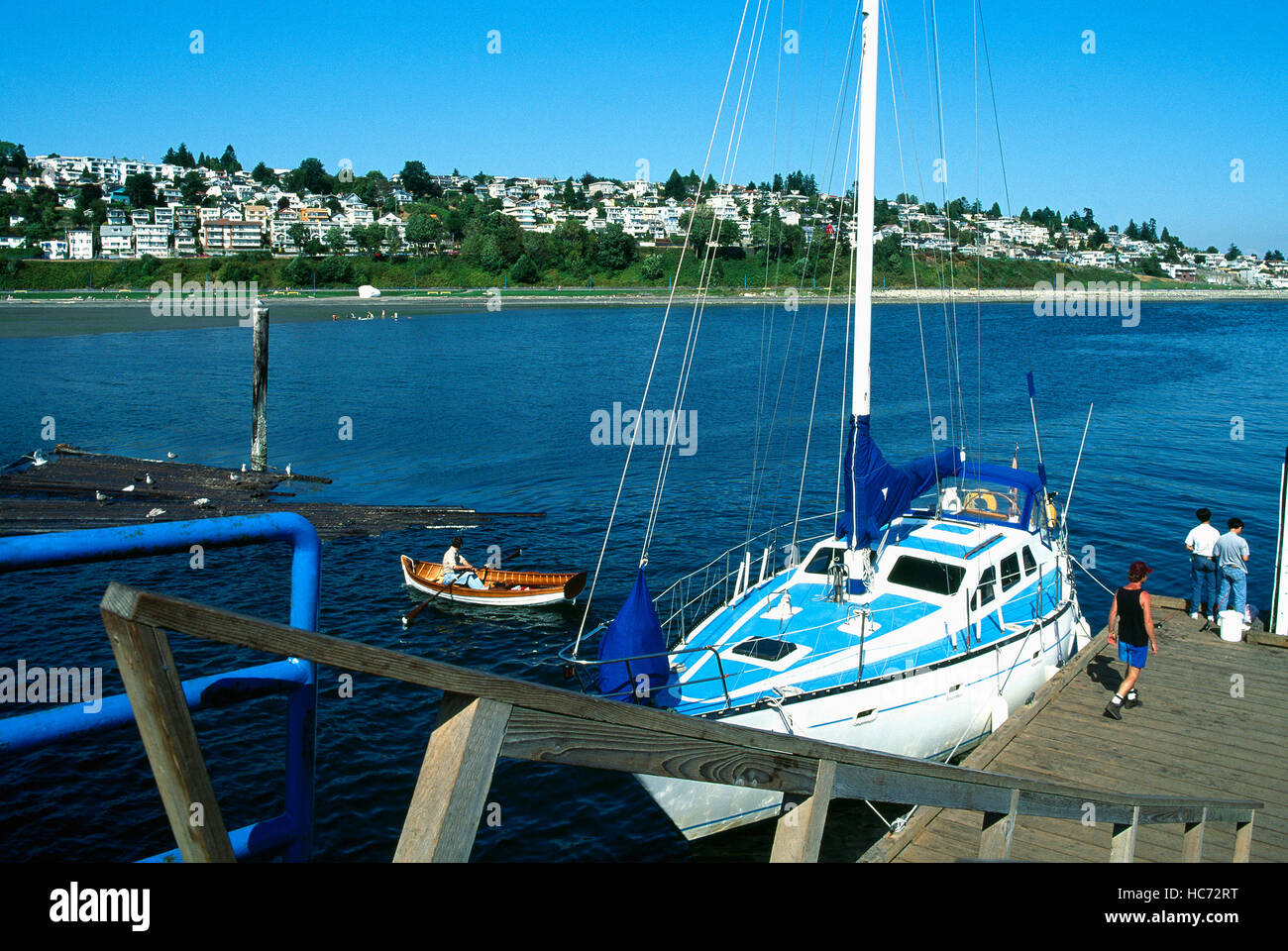 White Rock, BC, British Columbia, Canada - Sailboat docked at Pier in Semiahmoo Bay and Pacific Ocean Stock Photo