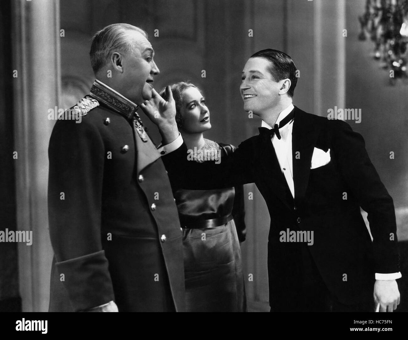 THE SMILING LIEUTENANT, George Barbier, Miriam Hopkins, Maurice Chevalier, 1931 Stock Photo