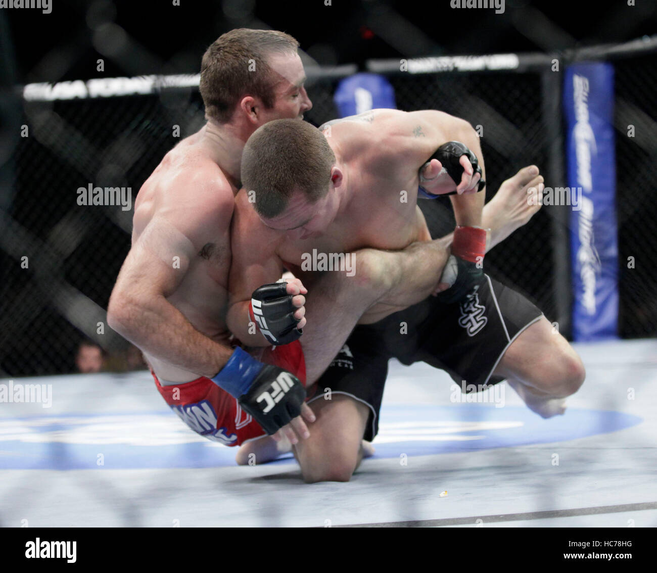 UFC fighter Paul Kelly, right, fights Jacob Volkmann at UFC-Live: Jones vs. Matyushenko at the San Diego Sports Arena on August 1, 2010, in San Diego, California. Francis Specker Stock Photo