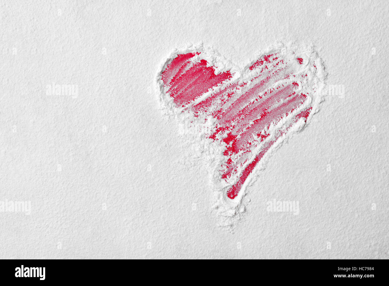 Heart shape in flour on red board. Love sign Stock Photo Alamy