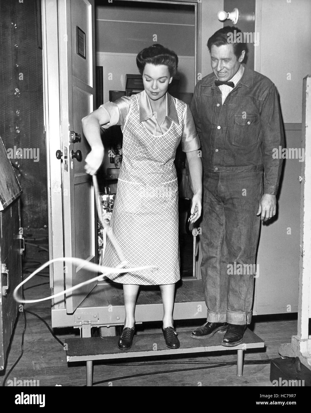 THE STORY OF WILL ROGERS, Jane Wyman practices rope tricks with Will