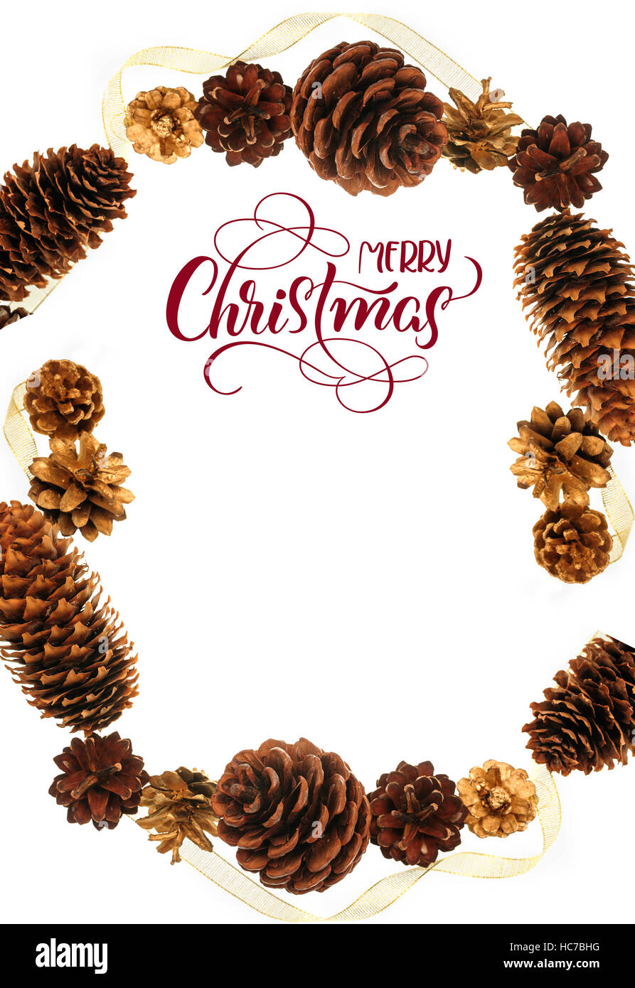 frame of pine cones and text Merry Christmas. Calligraphy lettering Stock Photo
