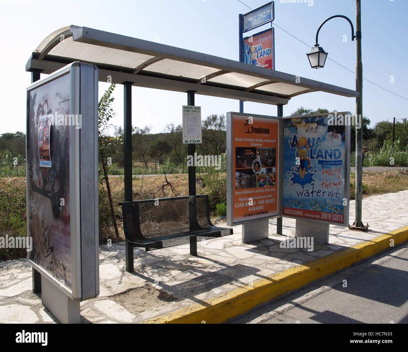 Public bus stop in Roda Corfu Greece Stock Photo - Alamy