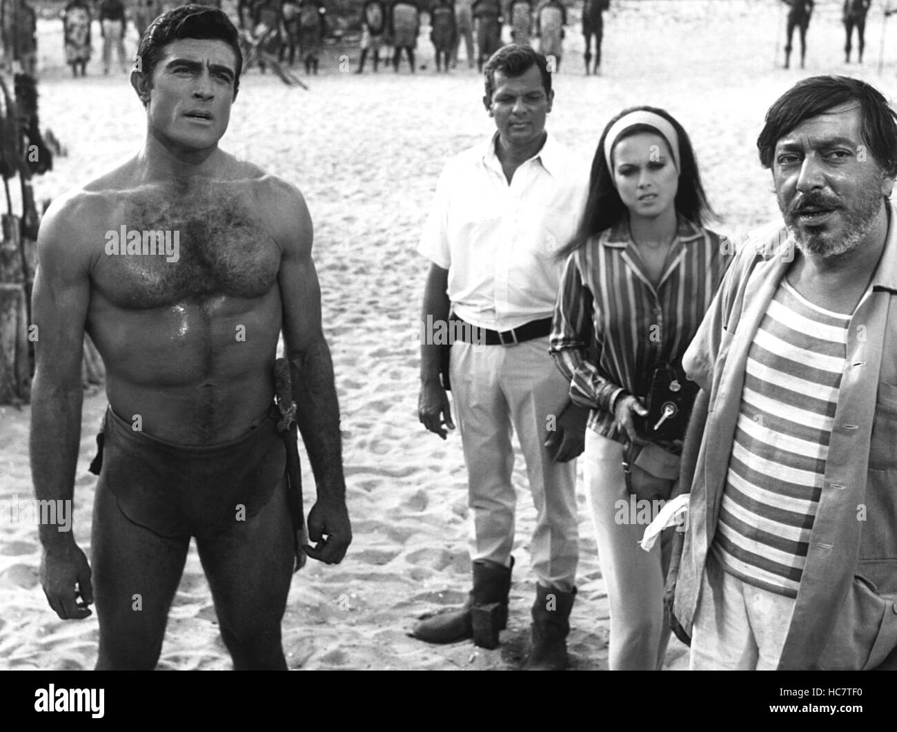 TARZAN AND THE JUNGLE BOY, left: Mike Henry (as Tarzan), second from right: Aliza Gur, 1968 Stock Photo