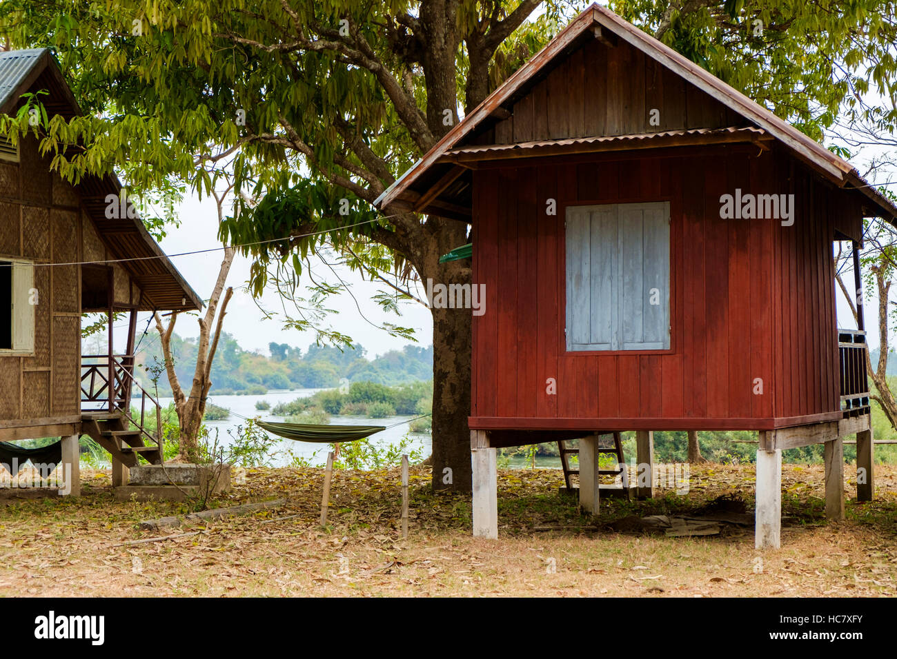 Bungalows on the Mekong River banks, Don Det island, 4000 Islands (Si Phan Don), Laos. Stock Photo