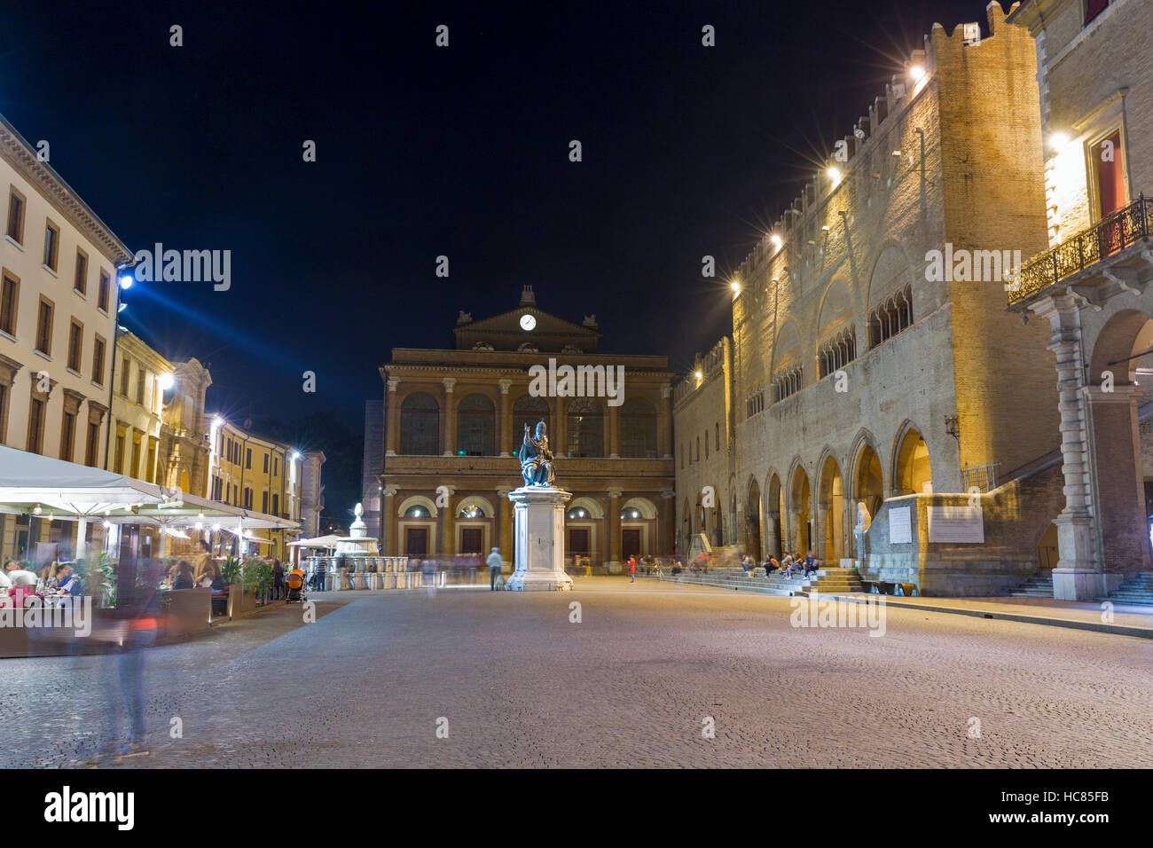 Cavour square with statue of Pope Paul V and public theater Amintore Galli at night in Rimini, Italy. Stock Photo