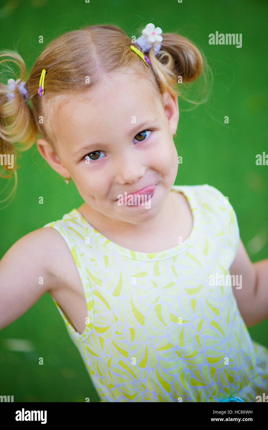 Portrait of cute little girl at playgraund Stock Photo - Alamy