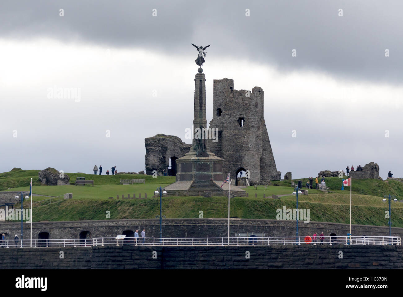 A view of Aberystwyth war memorial and castle ruins as seen from the seaside Stock Photo