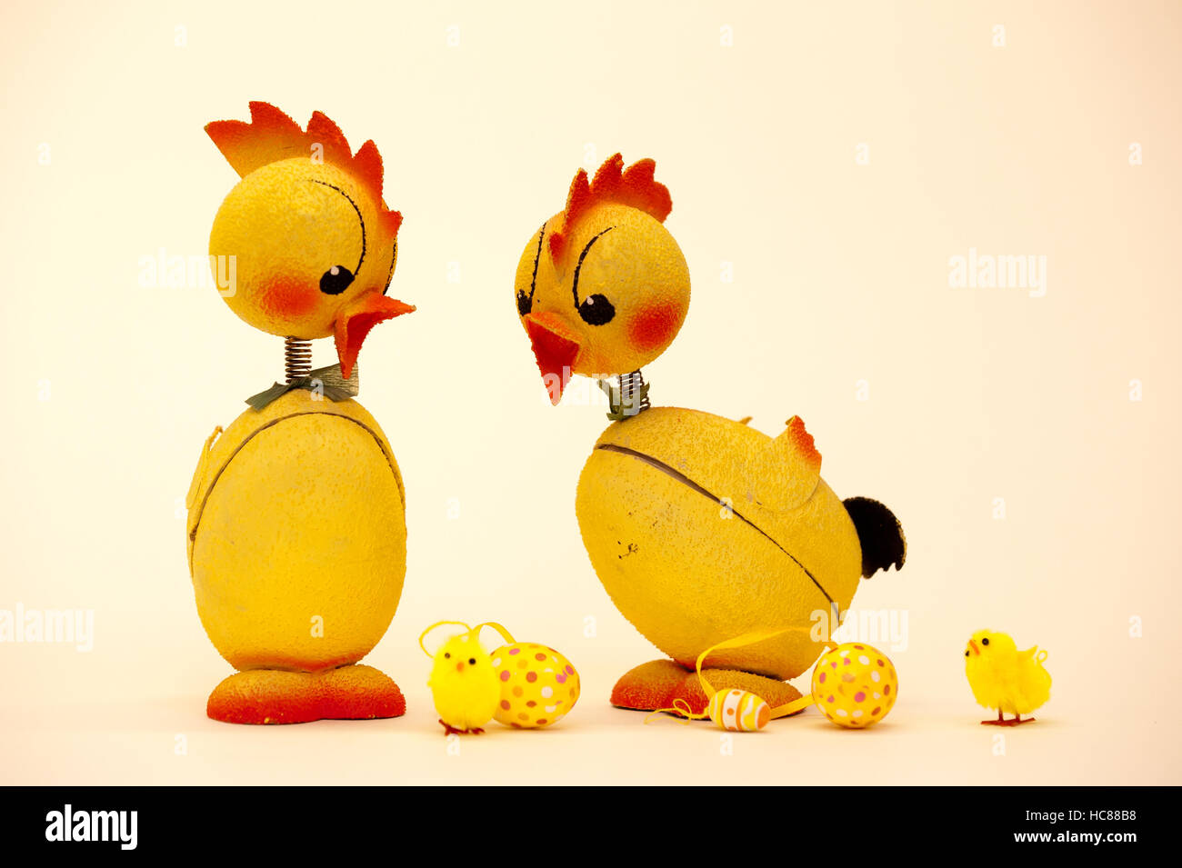 The Easter chickens from the fifties discuss lively the new ones and their eggs... Stock Photo